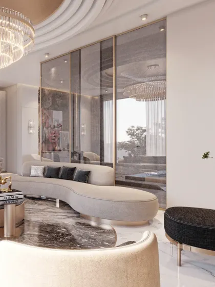 The interplay of materials is key in this space. The rich marble floor, soft fabric of the sofa, and metallic accents on the coffee table create a tactile and visually engaging experience.