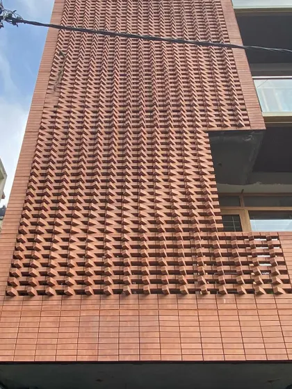 The completed parametric brick wall, creating a visually stunning texture that changes with the angle of the sun.