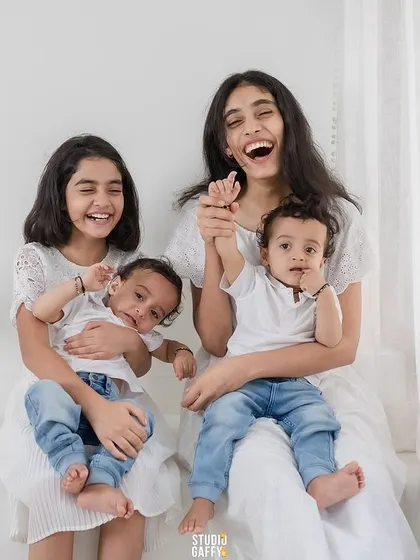 A moment of pure laughter and joy between four siblings.