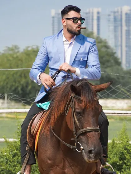 A bold and confident look featuring our light blue safari jacket. The design is inspired by classic field jackets but updated with our signature tailoring for a sharp, contemporary silhouette.
