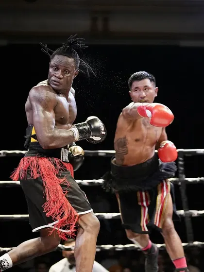 A perfect shot landed. This image captures the precision and impact that defines our fights.