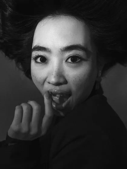 A playful and expressive black and white headshot. Capturing genuine emotion and personality is key to a headshot that gets you noticed.