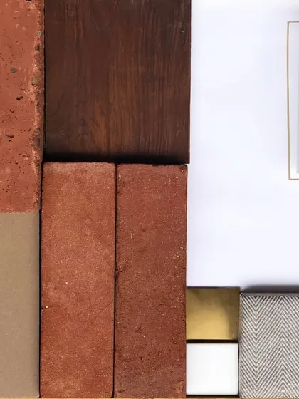 A material palette for the cafe, combining earthy terracotta brick, warm wood, brass accents, and neutral fabrics to create a grounded and inviting atmosphere.