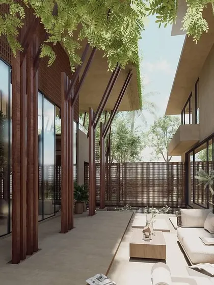 The courtyard of The Sanctuary is a serene outdoor living room. The space is sheltered by the main structure and surrounded by wooden screens, providing a private and tranquil area for relaxation.