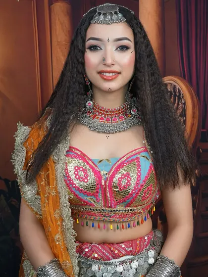 A full view of the colorful chaniya choli paired with our Navratri-inspired makeup and hair, ready for a night of dance.