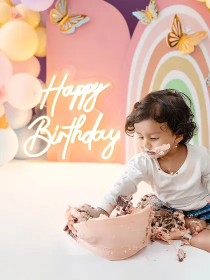The aftermath of a successful cake smash! This photo perfectly captures the fun and chaos of the celebration.