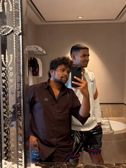 With Akash Deep of the Lucknow Super Giants. A sharp, short haircut that's ready for action.