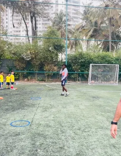 Coaches observing and guiding a training session for young players. Our team is always on hand to provide support and instruction.