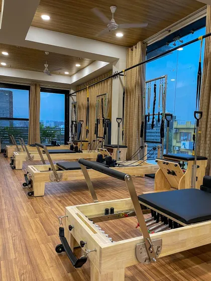 The warm wooden floors and thoughtful layout of our studio create a welcoming and serene environment. This is a space where you can leave the stress of the day behind and focus on your well-being.