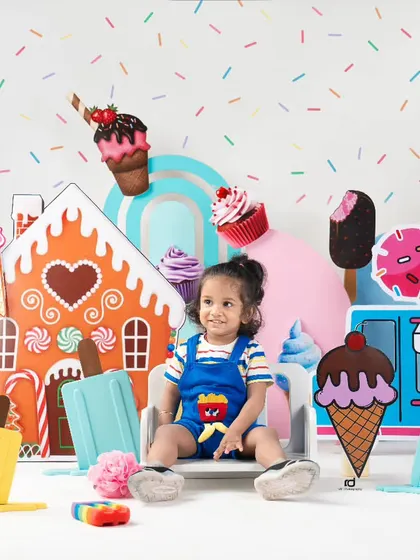 I scream, you scream, we all scream for ice cream. A super colorful and fun ice cream parlor theme for a toddler shoot.