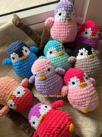 Our family of colorful penguin plushies. We get so many requests for these, and it's easy to see why. Their round, huggable shape and sweet faces make them irresistible.