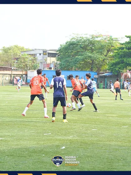 Intense midfield action from the U15 semi-final.