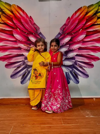 A sweet moment between a young Krishna and Radha. Our festival workshops are all about creating beautiful memories.
