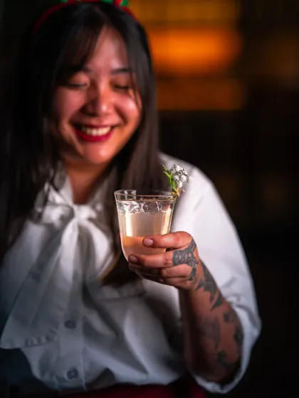 Wishing you a joyful and spirited festive season! A guest enjoys one of our holiday drinks, crafted with care and shaken with joy. Every sip captures the magic of the season.