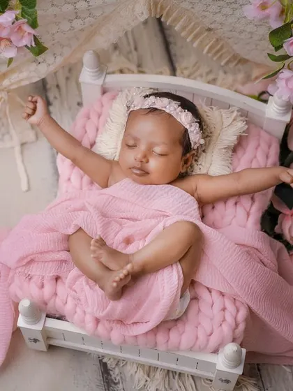 A big stretch from a sleeping beauty. I love capturing these little movements that show so much personality, even in sleep.