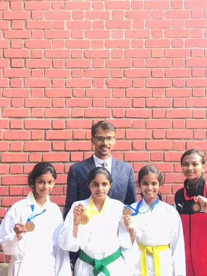 Our female champions from the district-level tournament. Their success is a testament to their hard work and the empowering environment we foster for all our students.