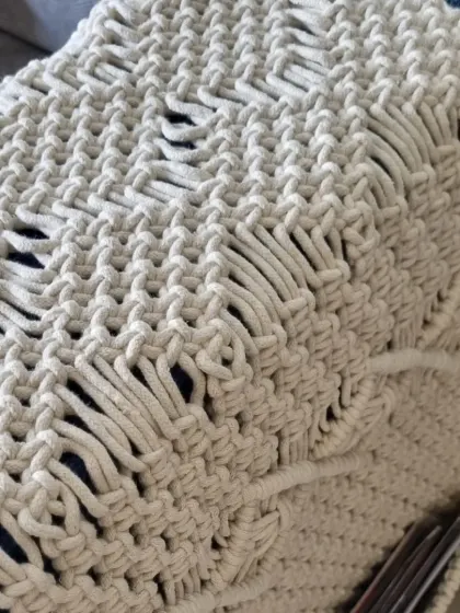 The back of the wall pocket, showing the clean and consistent knot work that gives the piece its structure and durability.