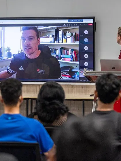An online presenter is displayed on the main screen, allowing international experts to contribute to our 2024 regional conference.
