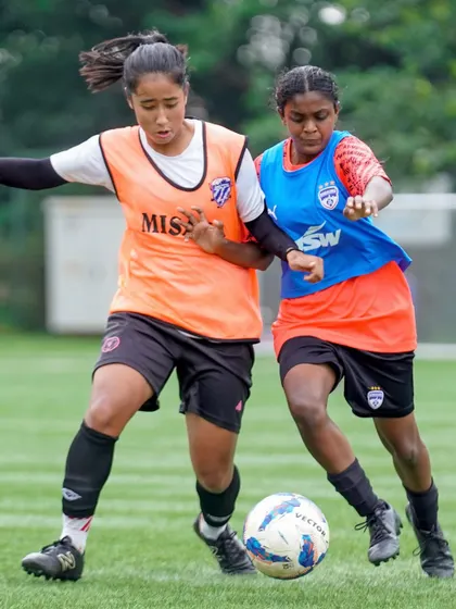 Janani Thoppur battles for possession during a friendly match ahead of the KWL season. Her journey from our schools to the women's team is an inspiration.