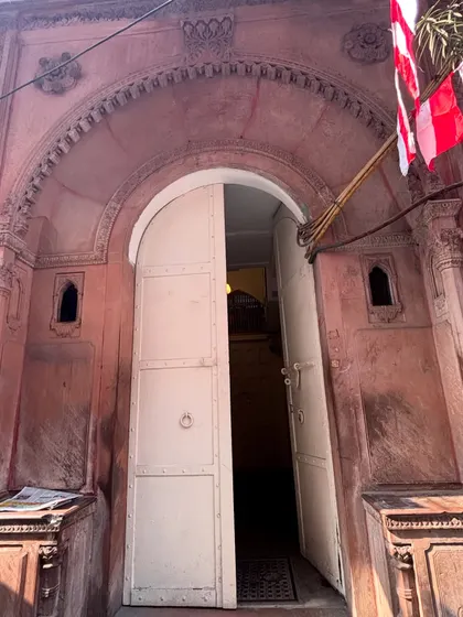 The entrance to a haveli, with its heavy doors slightly ajar, inviting curiosity. We love to speculate about the stories that have passed through these doorways over the centuries.