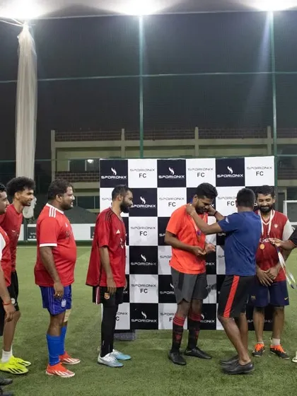 Awarding individual medals to players. We ensure every participant is recognized for their contribution during the prize distribution ceremony.