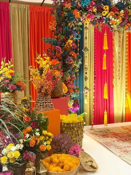A close-up of the floral decor for the Mehendi stage. We use a variety of flowers and colors to create a lush and celebratory look.