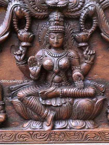 A close-up of Goddess Lakshmi from the 48-inch panel, her four arms holding lotuses and bestowing blessings.