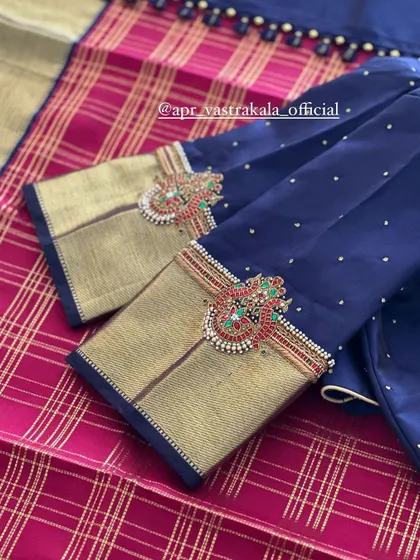 The sleeves are the highlight of this design, with bold, traditional motifs.