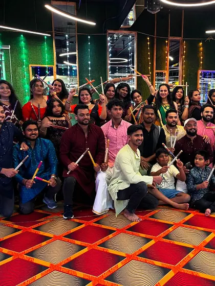 Another fantastic group shot with the whole squad. I love seeing men, women, and kids all come together to celebrate with dance.