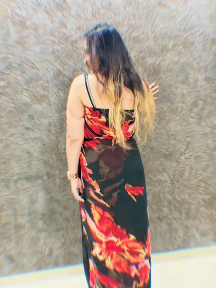 The back view of the sarong drape, showing how the fabric flows gracefully.