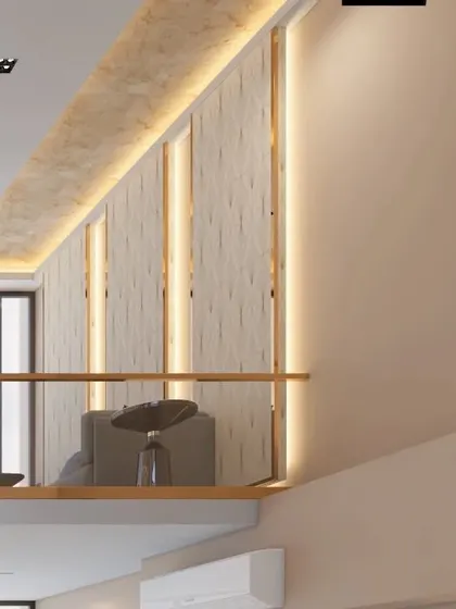 A view from the lower level looking up to the mezzanine, showing how the different design elements and levels connect. The consistent use of materials creates a cohesive and integrated design.