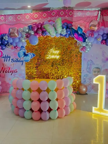 Another angle of the elaborate butterfly-themed birthday setup.