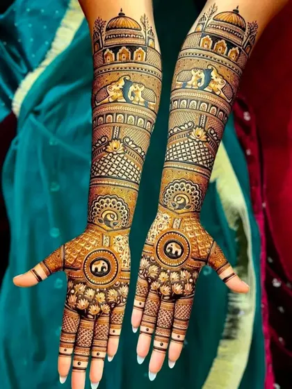A royal-themed design with elephants, peacocks, and palace domes. The circular patterns on the palms are a classic touch.