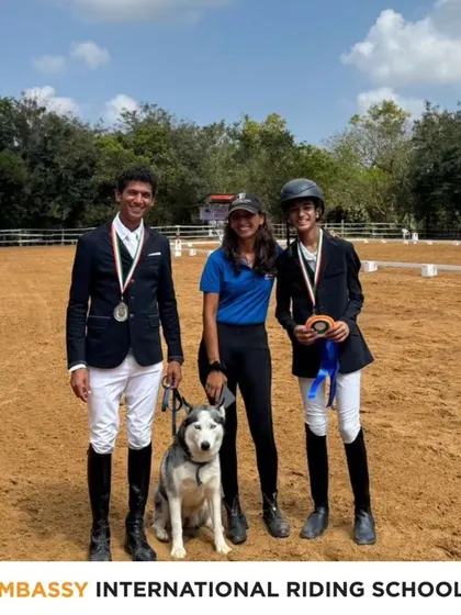 Our riders and their furry mascot celebrate a Team Silver Medal at the National Equestrian Championship Dressage. It's all about teamwork and supporting each other.