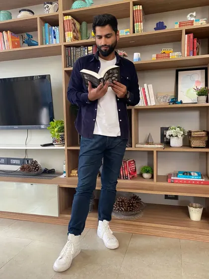 A fun shot of Harsh pretending to read during our shoot. He was an absolute pleasure to work with.