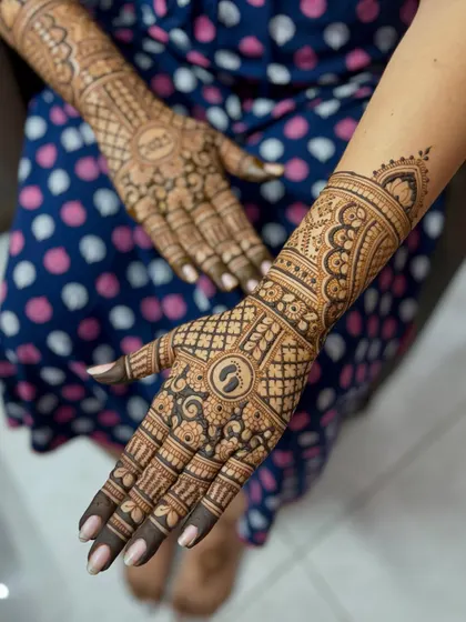 A single-hand view of the baby shower design, focusing on the detailed forearm patterns.