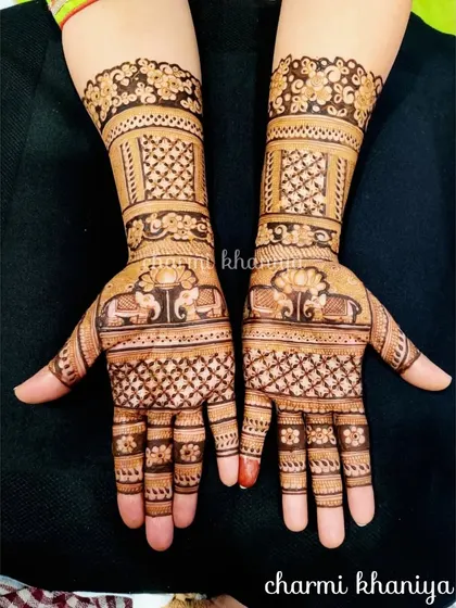 A classic design featuring elephants and lotus motifs. The checkerboard pattern on the arms adds a lovely traditional touch.