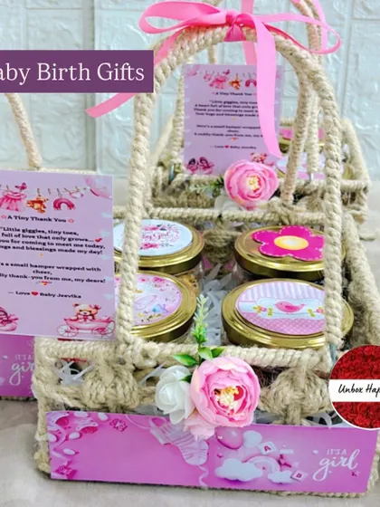 A lovely "It's a girl" announcement favor in a rustic jute basket. This option includes four jars of treats and a personalized thank you card.