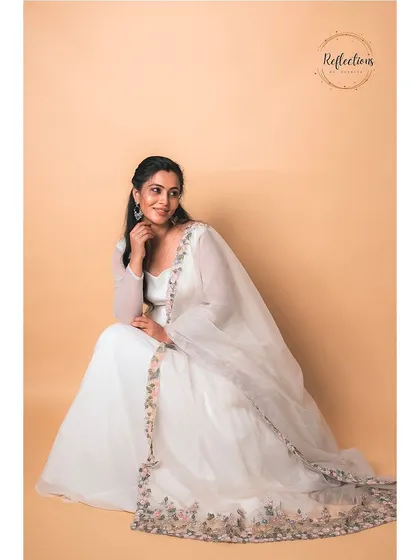 The full view of the elegant white gown, perfect for a sophisticated look.