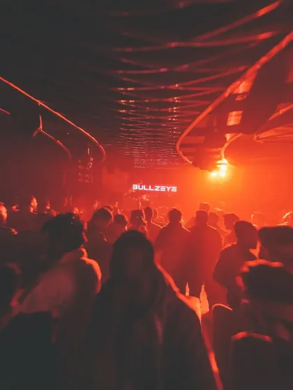 The dance floor in Siliguri was a sea of people, lost in the music under the red lights. An absolutely spectacular night.