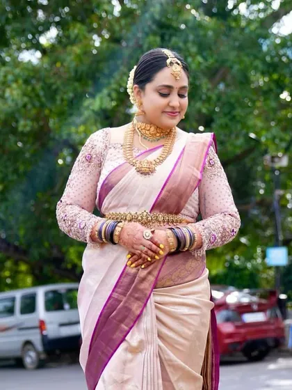 A full-length view of the bride's elegant muhurtham look.