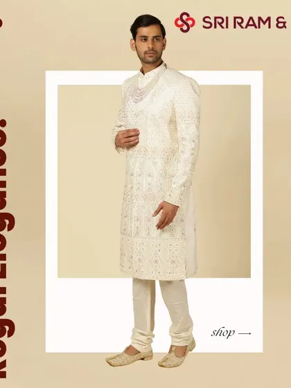 Regal elegance in every thread. This pristine white sherwani with delicate embroidery is a testament to our craftsmanship, designed for the groom who seeks a timeless and sophisticated wedding look.