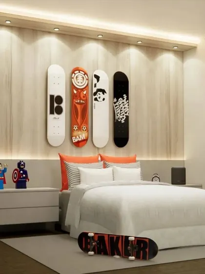 A skateboard-themed bedroom, with actual skateboards used as wall decor above the bed.