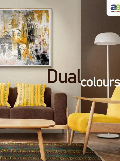 We created a warm and inviting living room using a dual-colour scheme. A rich brown accent wall provides a backdrop for the vibrant yellow armchair and cushions, demonstrating how strategic colour combinations can enhance your existing furniture and decor.