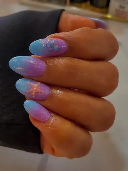 A whimsical purple and blue ombré with a glittery finish, adorned with cute starfish and butterfly details.