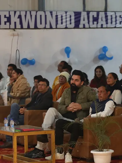 The audience at our annual awards, filled with athletes, parents, and supporters. This shows the large and engaged community that is part of the Peace Taekwondo family.