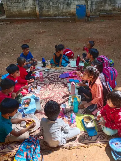 A special outdoor picnic lunch for Christmas. Eating together on a mat under the sun adds a sense of adventure and community to our mealtime.