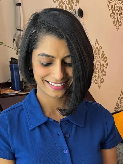The latest of Deepika's many fab haircuts. This time, a chic asymmetrical bob.