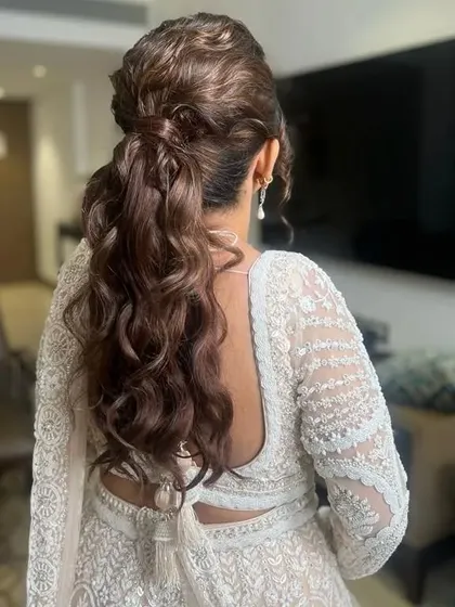 Another angle of the textured messy ponytail, showing the beautiful waves and the soft, romantic feel of the style.