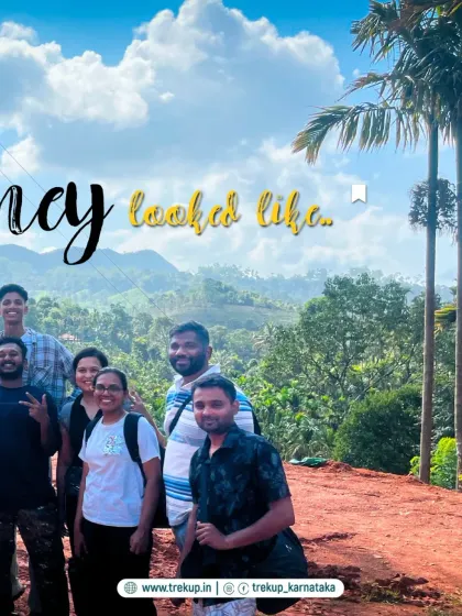 This is what the journey looked like. A group of trekkers posing for a photo against a backdrop of beautiful hills.